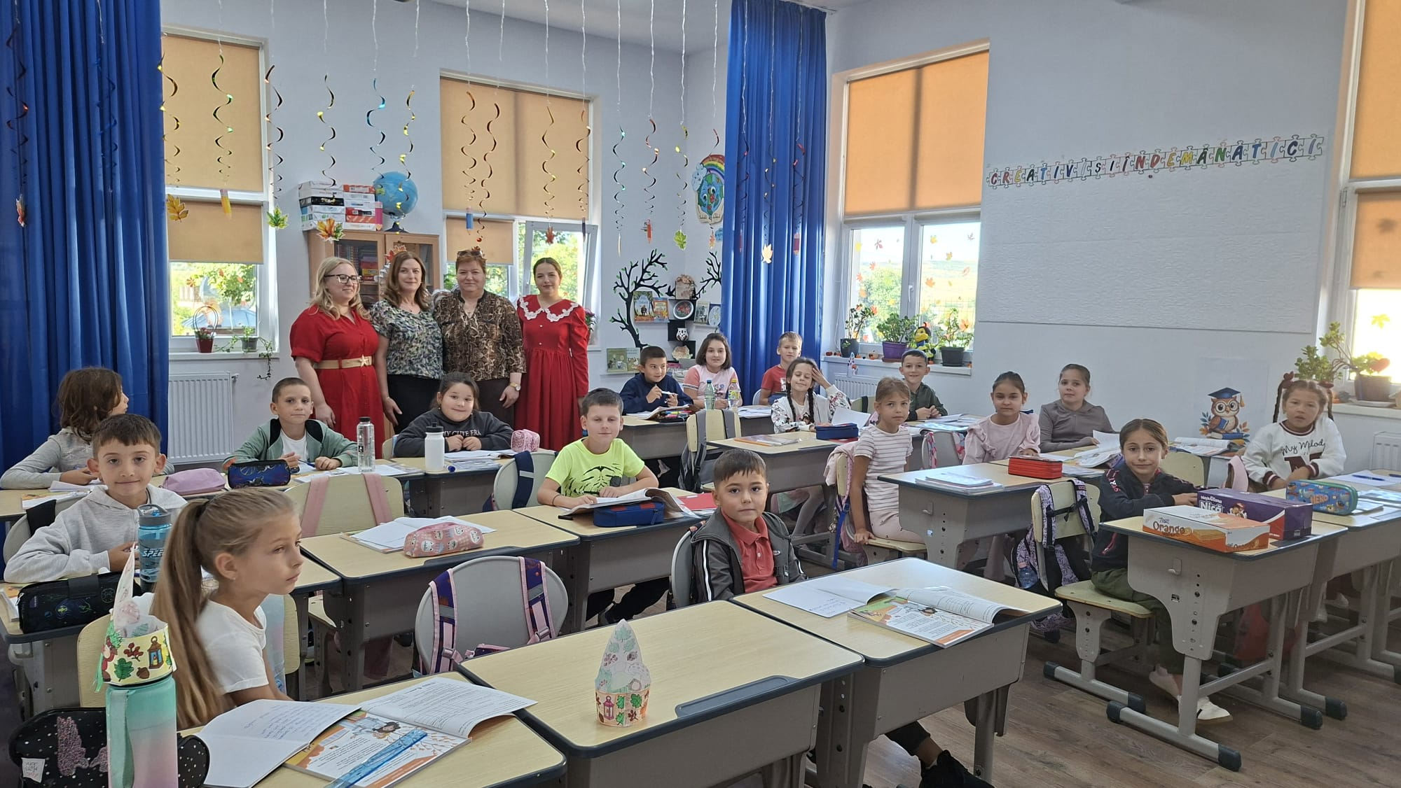 Peste 80 de copii din Erbiceni au primit ghiozdane noi
