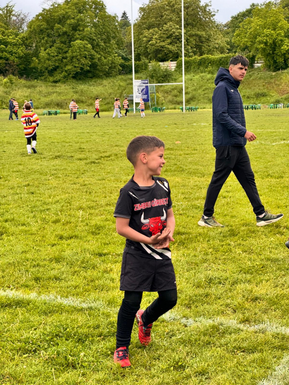 GALERIE FOTO -- O zi cu suflet sub stropii de ploaie. Copiii rugby-ului, între joc și vis