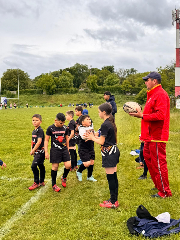 GALERIE FOTO -- O zi cu suflet sub stropii de ploaie. Copiii rugby-ului, între joc și vis