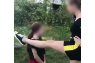 VIDEO Una dintre minorele care au bătut și umilit o fetiță a fost REȚINUTĂ, deși are 14 ani