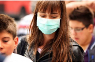 OMS: Carantina ar putea fi evitata daca 95% dintre oameni ar purta masca de protectie, in loc de 60% ca acum