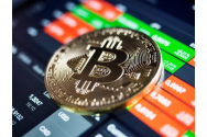 Record - criptomoneda bitcoin a depăşit plafonul de 25.000 de dolari