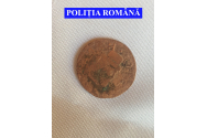 Monedă de tezaur, descoperită în urma de un gospodar în timp ce-și săpa grădina