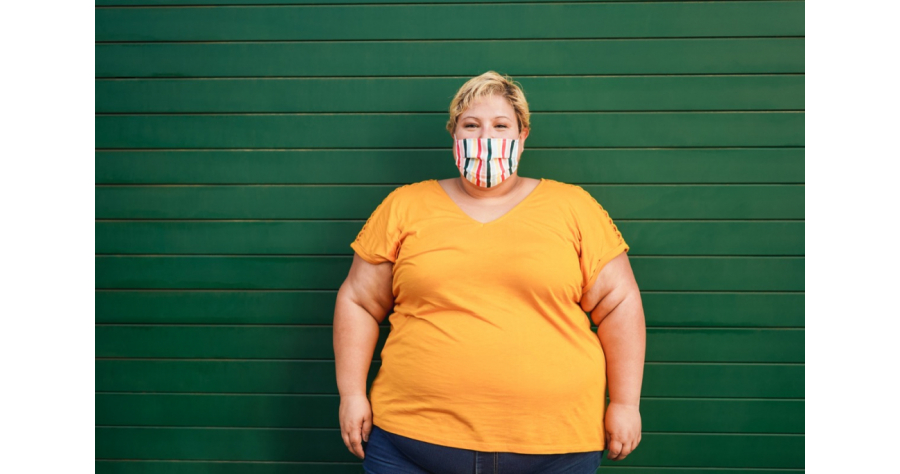 woman-obese-obesity-overweight-wall