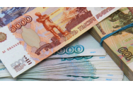 Tensiunile Rusia-Ucraina: Rubla rusească, la cel mai redus nivel din ultimul an. Bursa de la Moscova scade