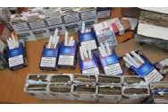 Percheziţii în Iaşi şi Republica Moldova într-un dosar de contrabandă cu ţigări