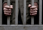 Un deţinut din Penitenciarul Iaşi a ucis un coleg cu găleata pentru smântână